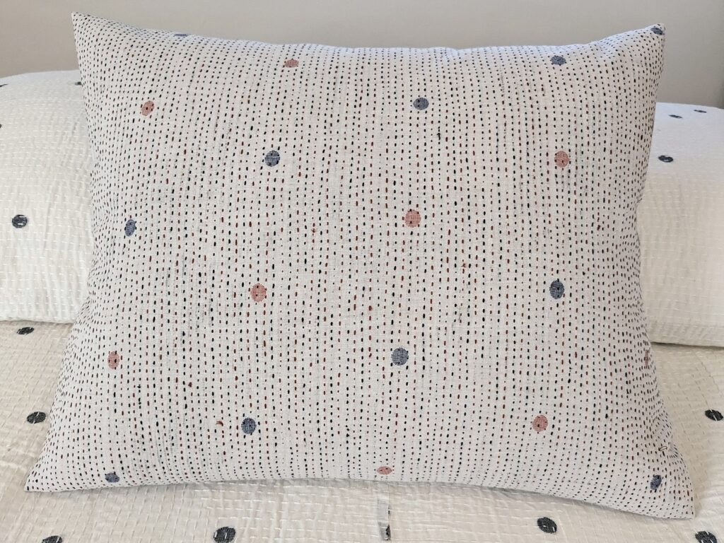 Pillow, horizontal- white with rust and navy Muslin jamdani and kantha stitching