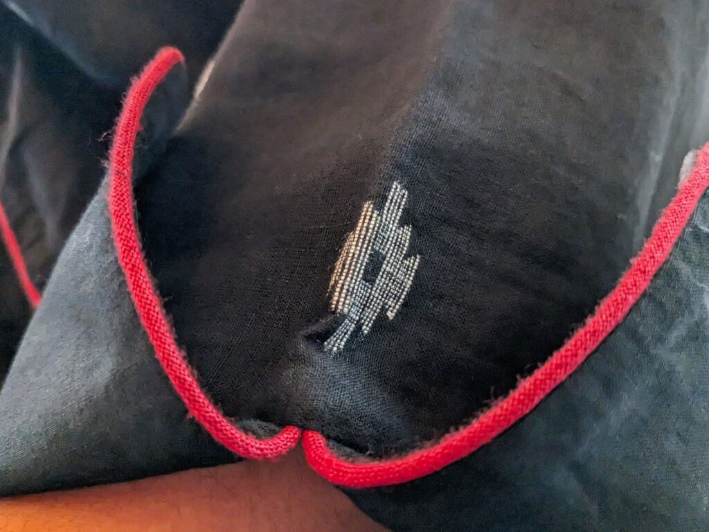 Robe- navy black with white diamond detail of cuff and piping Muslin jamdani