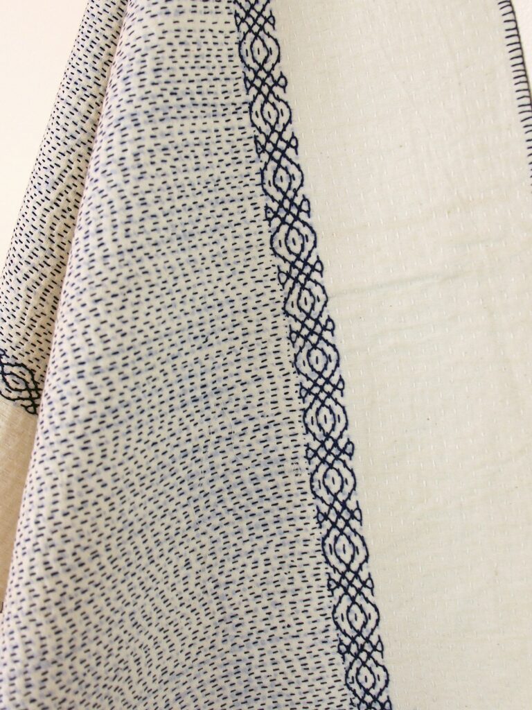 Throw quilt- blue on white detail Muslin with kantha stitching